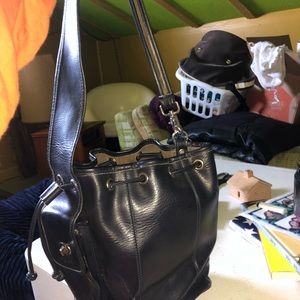 Black vintage coach over the shoulder purse.